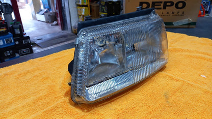 FARO PROIETTORE SX SINISTRO VOLKSWAGEN PASSAT DAL 1996 AL 2000 H7-H1 NO-FEND.
