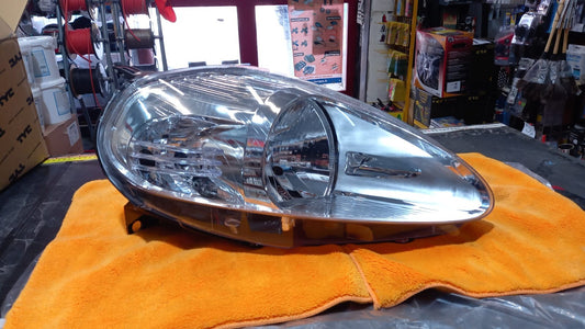 FARO PROIETTORE DX DESTRO FIAT GRANDE PUNTO DAL 2008 IN POI PRESA VIOLA