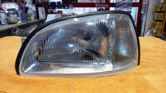 FARO PROIETTORE SX SINISTRO RENAULT CLIO DAL 1996 AL 1998